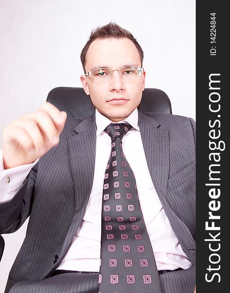 Young businessman with a pair of modern glasses