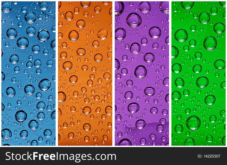 Blue, orange, violet and green water drops. Blue, orange, violet and green water drops