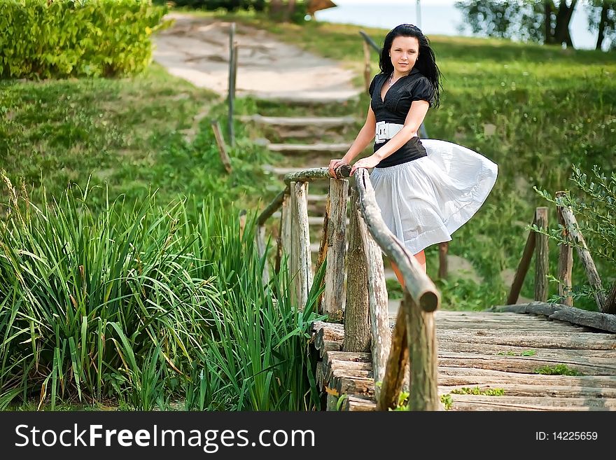 Young girl on the bridge