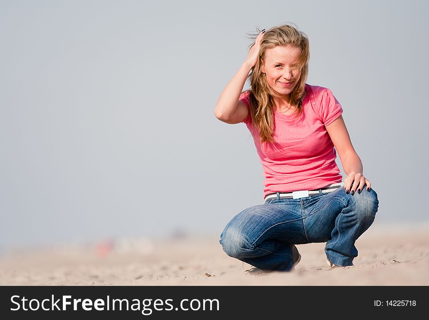 Young Woman On Sea Shore