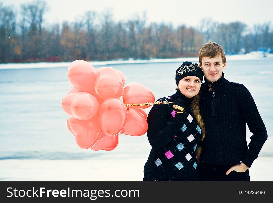 Young couple in love smiling and hugging