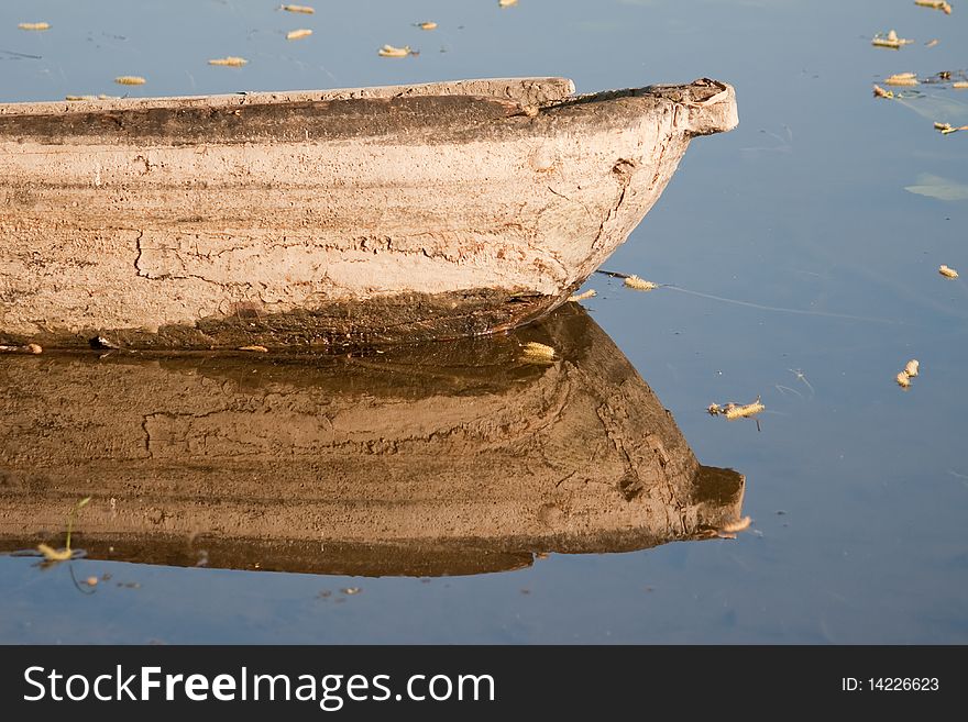 Old fishing boat from the river bank. morning