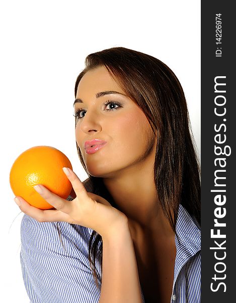 Young beautiful woman with citrus orange