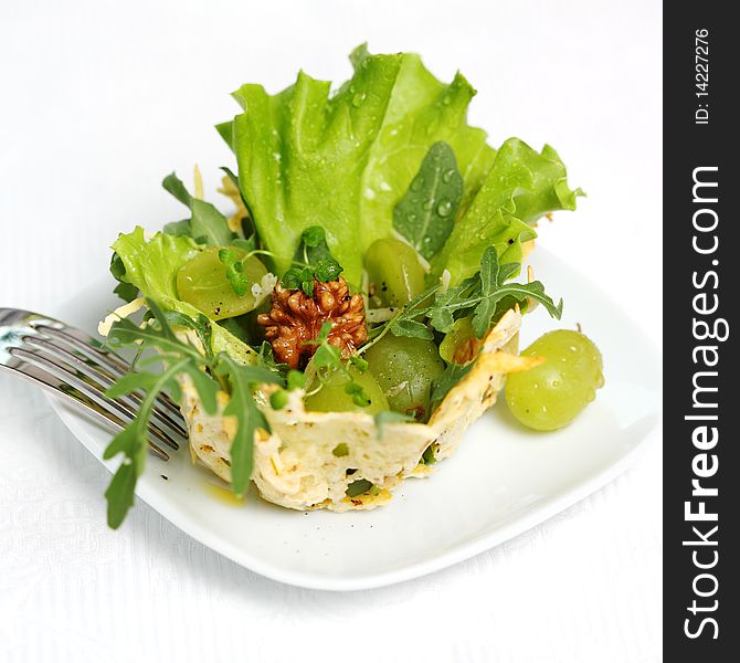 Parmesan, walnut and arugula salad. Parmesan, walnut and arugula salad