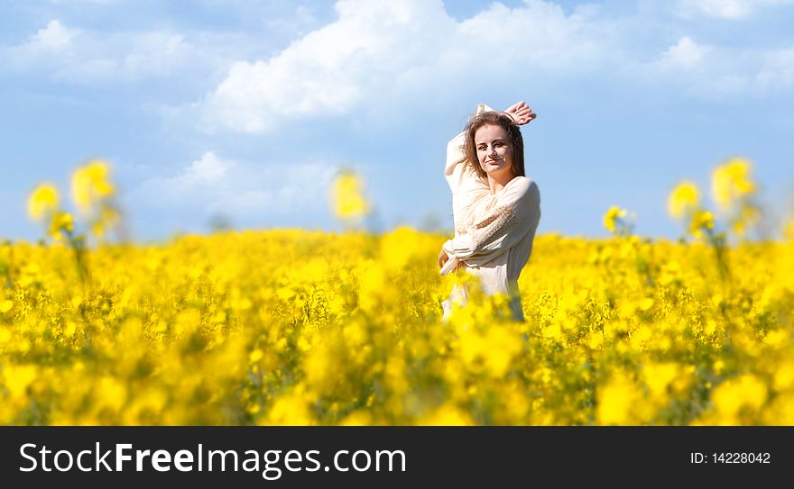 Happy Girl In Yellow Flowers