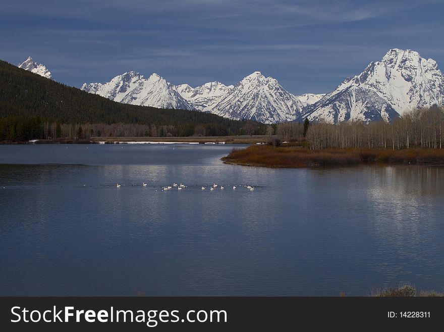 Reflection in the lac of the Grand Tetons in Wyoming