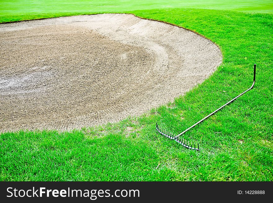 Golf bunker sand on the green