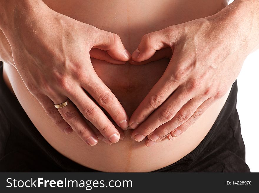 Advanced pregnant belly with woman and man hands. Advanced pregnant belly with woman and man hands
