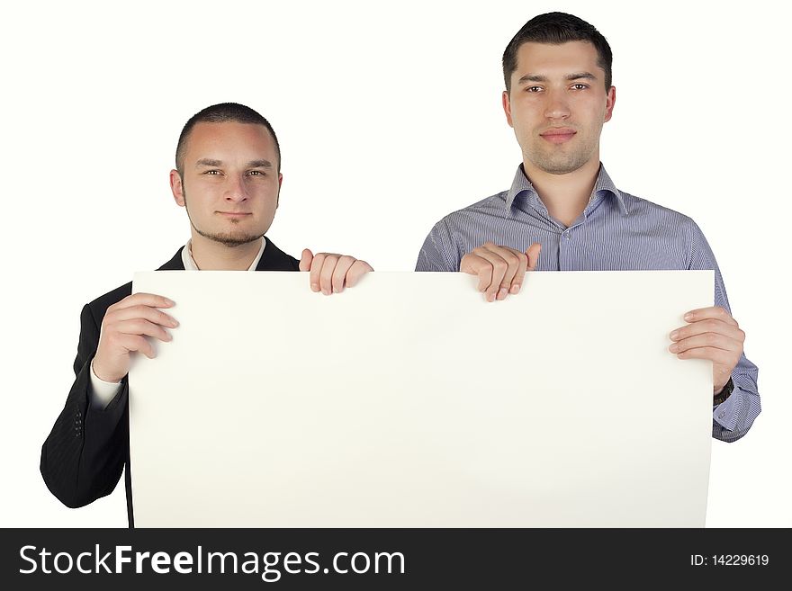 Two business people holding a shit of paper. Two business people holding a shit of paper