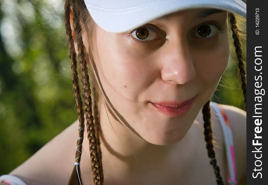 Teen girl looking at the camera very close. Teen girl looking at the camera very close