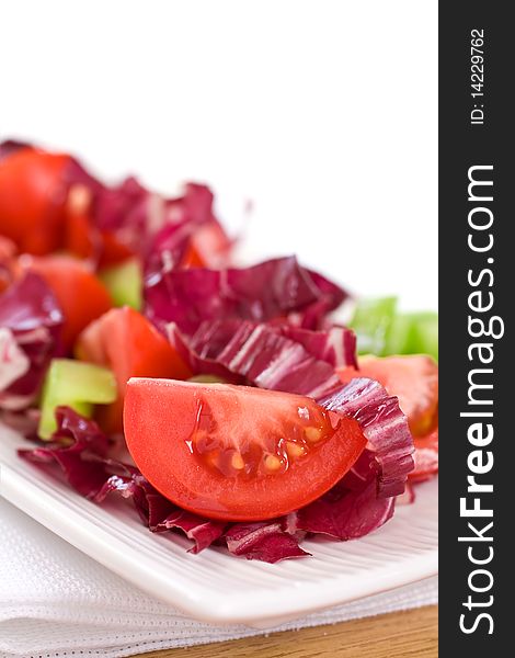 Closeup Of Radicchio Salad and Cut Tomato. Closeup Of Radicchio Salad and Cut Tomato