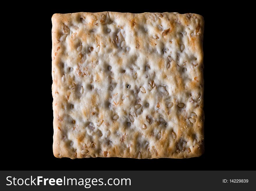 Sesame cracker isolated on black background with clipping path. Sesame cracker isolated on black background with clipping path.