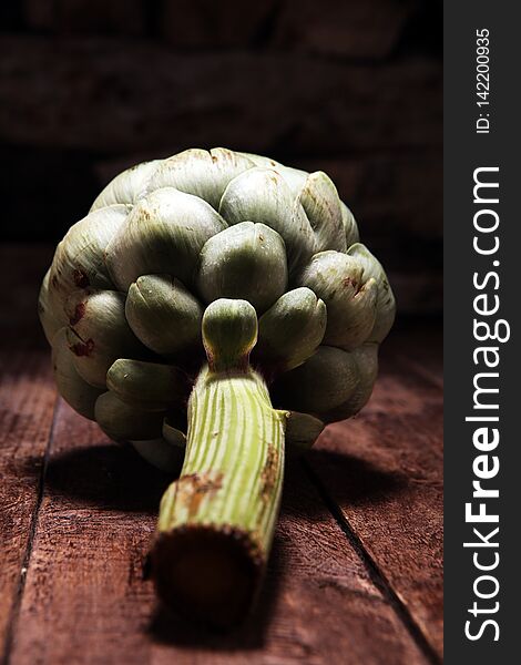 Artichokes On Rustic Background. Fresh Organic Artichoke Flower Set