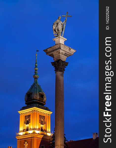 King Sigismund III Vasa column and clocktower of the Royal Castle at night, city of Warsaw, Poland. King Sigismund III Vasa column and clocktower of the Royal Castle at night, city of Warsaw, Poland