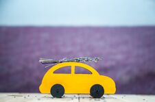 Concept Journey Through The Lavender Fields, Car With A Bouquet Of Lavender Rides On The Background Of A Lavender Stock Image