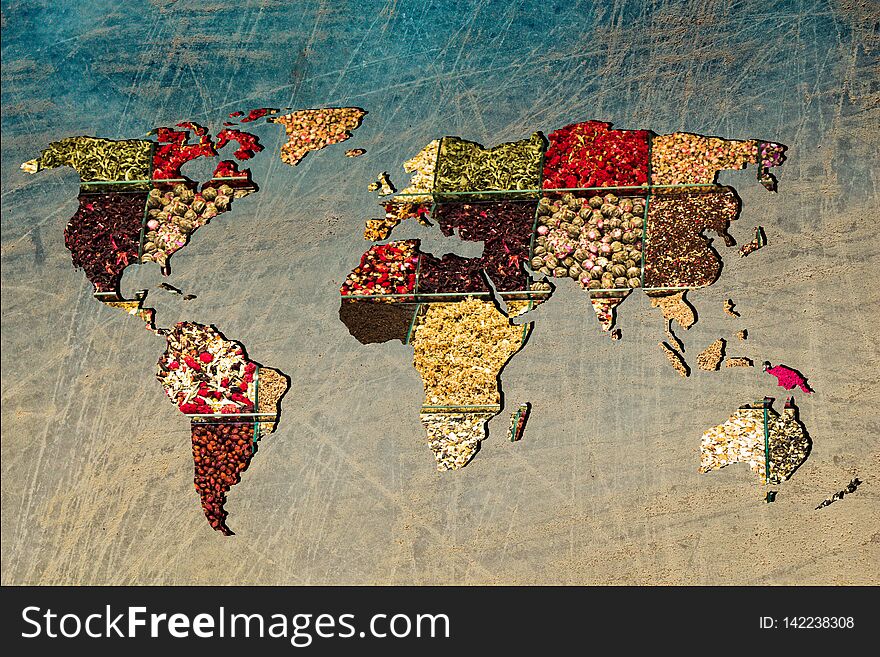 Roughly outlined world map with veraity of spice filling