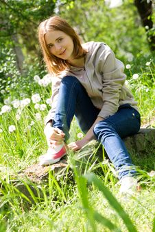 Beautiful Young Woman Sitting In Dandelions Royalty Free Stock Image Beautiful Young Woman Sitting In Dandelions Royalty Free Stock Image