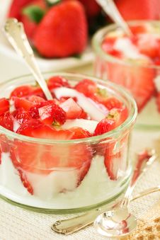 White Yogurt And Strawberries Royalty Free Stock Photos