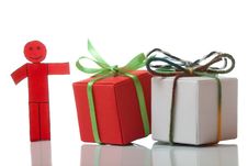 Red Toy Man And Present Boxes Stock Photo Red Toy Man And Present Boxes Stock Photo