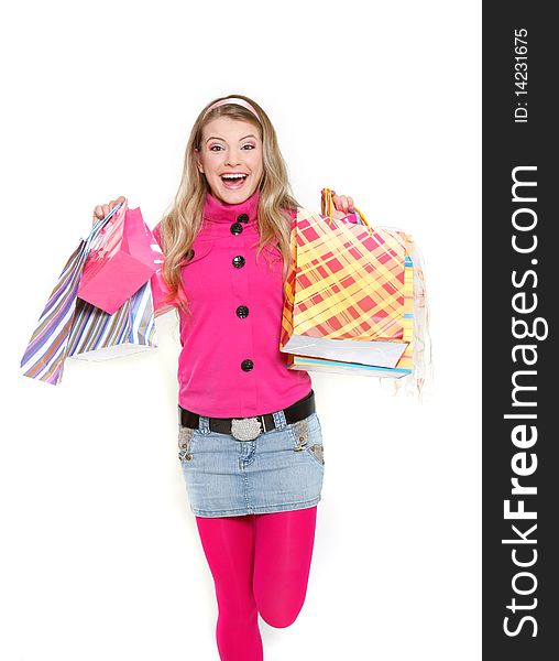 Young happy girl with shopping bags