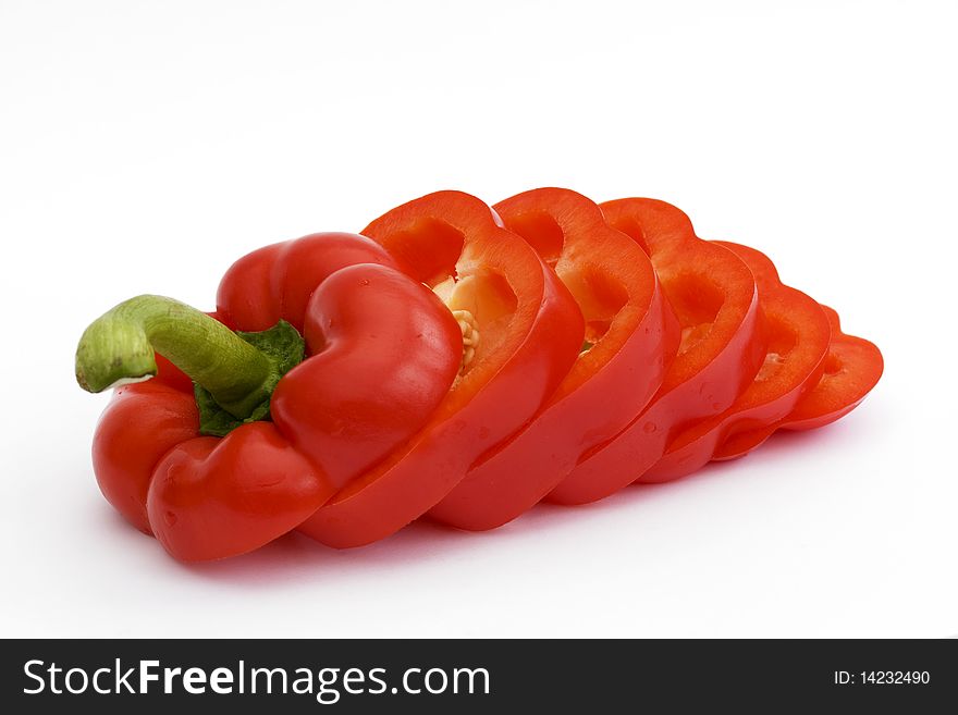 Sliced red pepper on white