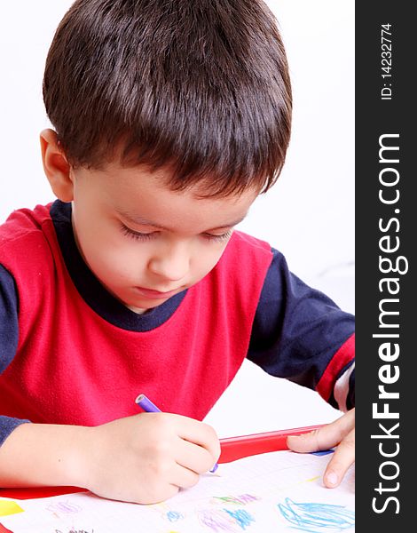 Five years old child writing, White background