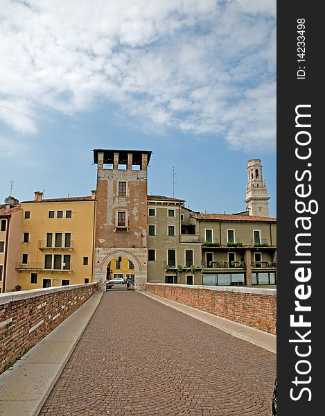 The guard tower along the ponte pietra bridge in verona in italy. The guard tower along the ponte pietra bridge in verona in italy