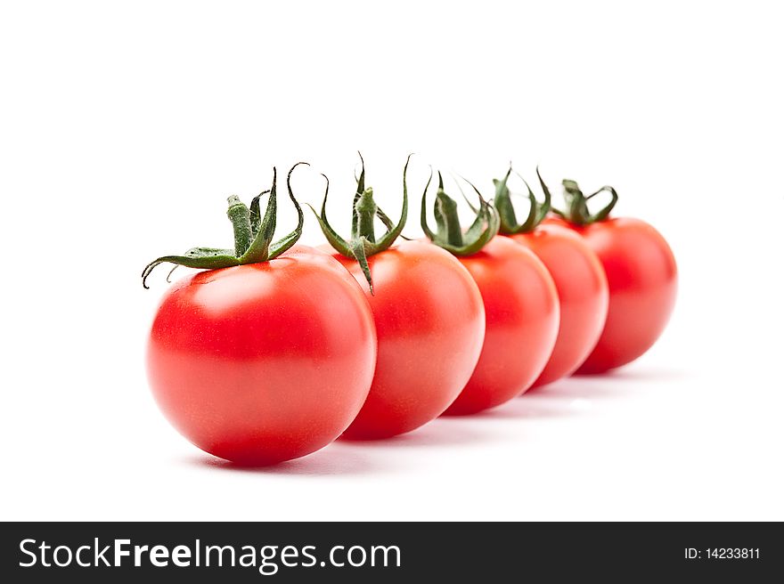 Close-up of fresh tomato on white background. Close-up of fresh tomato on white background