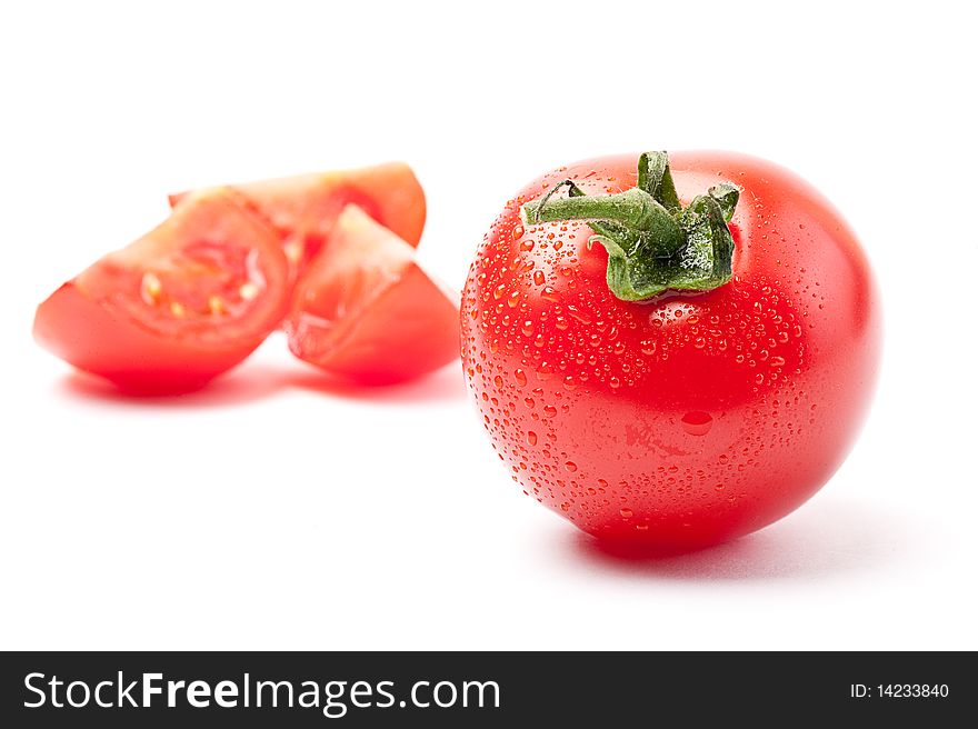 Close-up of fresh tomato on white background. Close-up of fresh tomato on white background