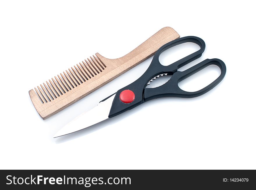 Scissors and combs isolated on a white background