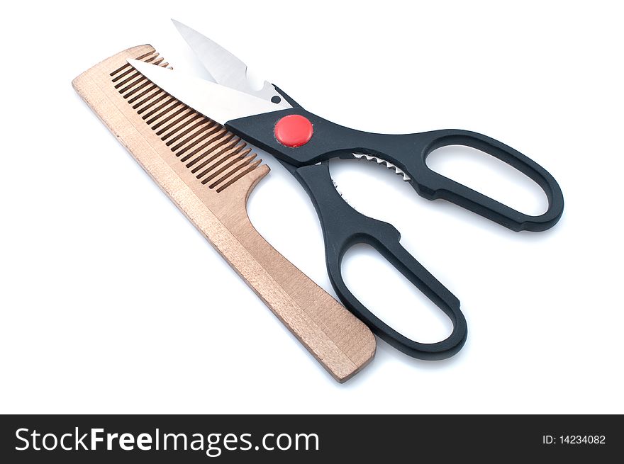 Scissors and combs isolated on a white background