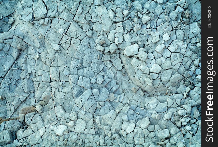 Grey chapped stone abstract background. Grey chapped stone abstract background