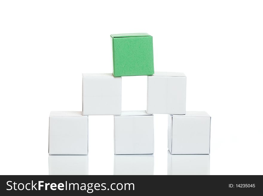 Pyramid from boxes on white isolated background. Pyramid from boxes on white isolated background