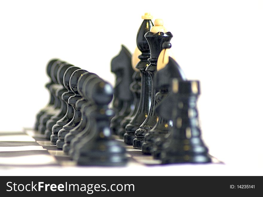 In line black chess figures