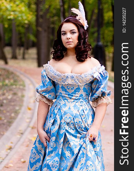 Portrait of lady in blue baroque dress