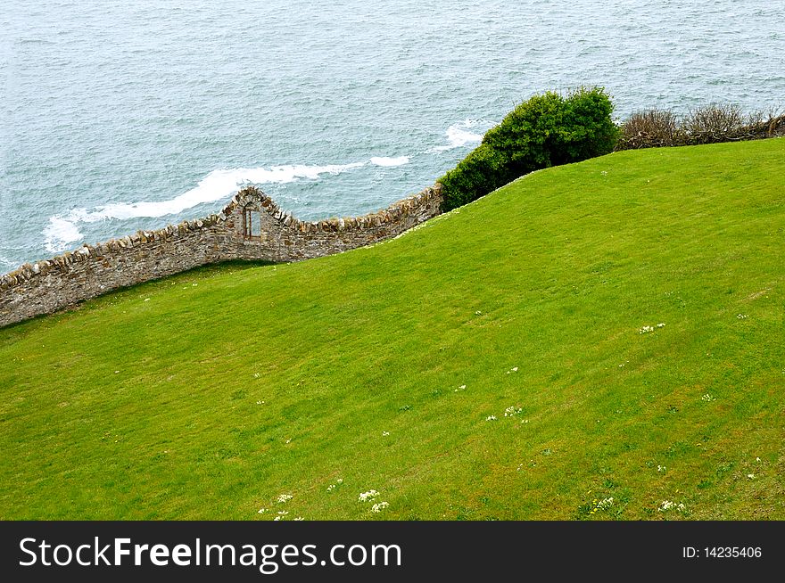 Stone fencing by the ocean in Ireland