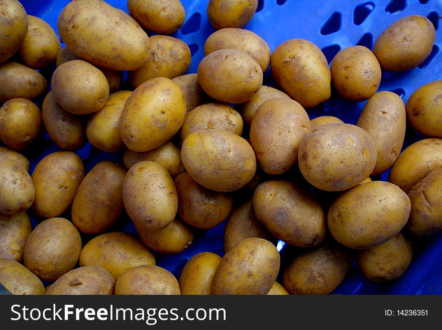 Potatoes in a basket at farmers market