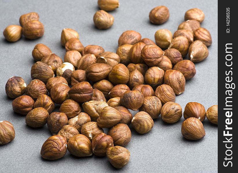 Scattered Hazelnuts On Kitchen Worktop