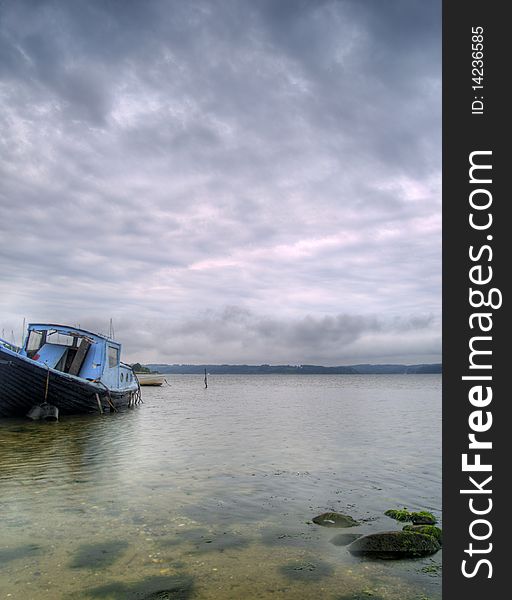 HDR image of an old boat in Denmark. HDR image of an old boat in Denmark