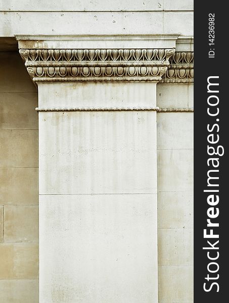 Squared column detail in white stone