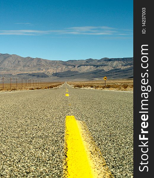 Desert road through Death Valley National Park