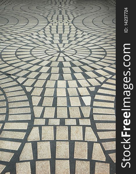An abstract view of a large outdoor tiled floor. . An abstract view of a large outdoor tiled floor.