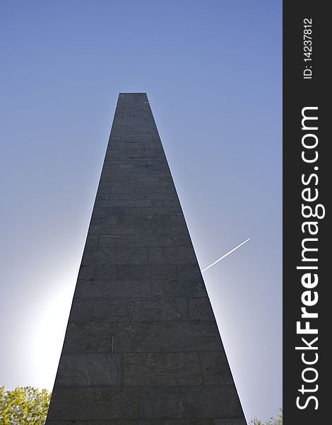 A Union Civil War Monument stands in bright sunlight with a blue sky and jet contrail. This monument is located in Harrisburg, PA near Lake Park. A Union Civil War Monument stands in bright sunlight with a blue sky and jet contrail. This monument is located in Harrisburg, PA near Lake Park.