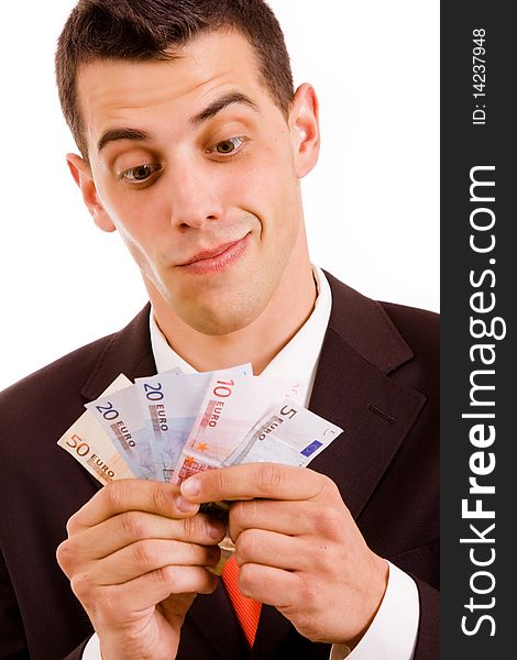 Happy young business man with money, over white background. Happy young business man with money, over white background