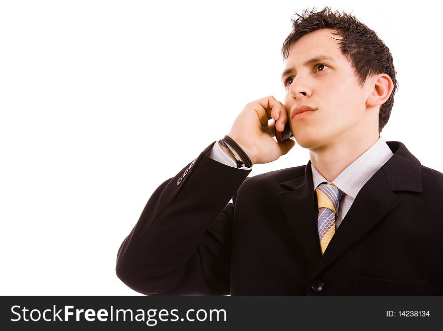 Young business man on the phone, isolated on white background