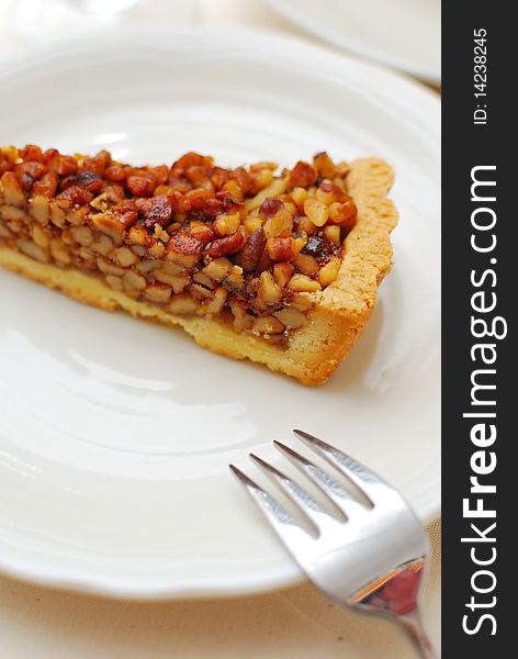 Hazel nut tart with fork