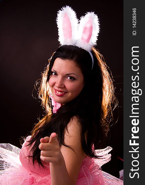 Woman wearing fancy dress on Halloween. A young female dressed up as rabbit Cute girl in playboy costume on white backgrounds. Woman wearing fancy dress on Halloween. A young female dressed up as rabbit Cute girl in playboy costume on white backgrounds.