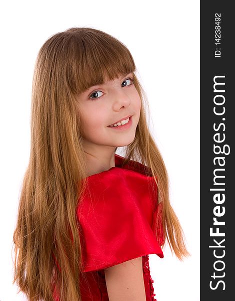 Close-up portrait of a beautiful blond girl. Little girl is wearing in red dress.