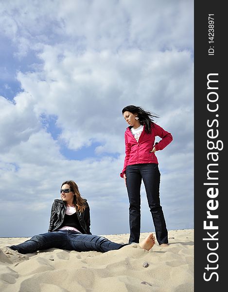 An image showing young girls on the beach. An image showing young girls on the beach