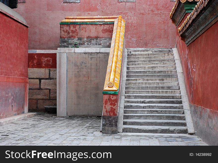 This is a shot of a traditional styled Chinese stair well and walk area. This is a shot of a traditional styled Chinese stair well and walk area.